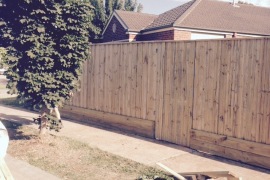 2.1m Fence with inbuilt gate Capped
